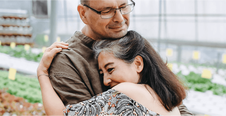 older couple hugging