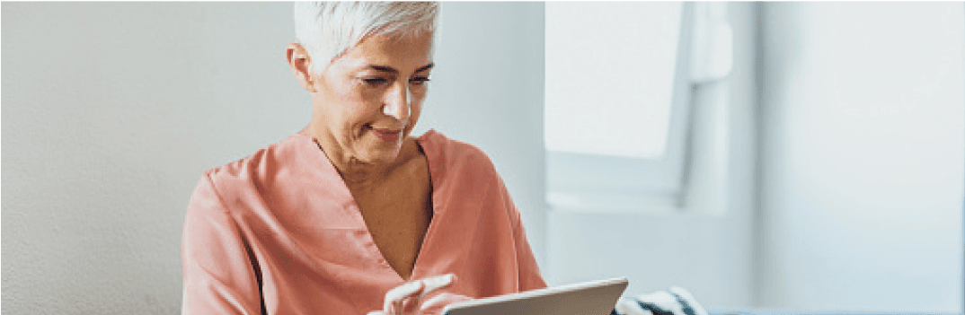 older woman on tablet